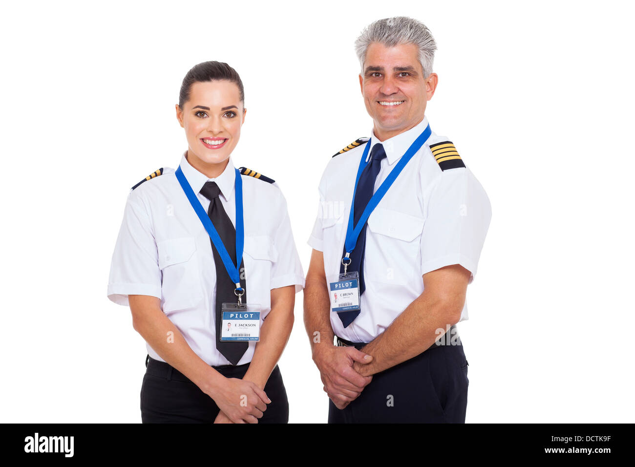 professionelle kommerzielle Fluglinie Kapitän und erster Offizier Portrait auf weißem Hintergrund Stockfoto