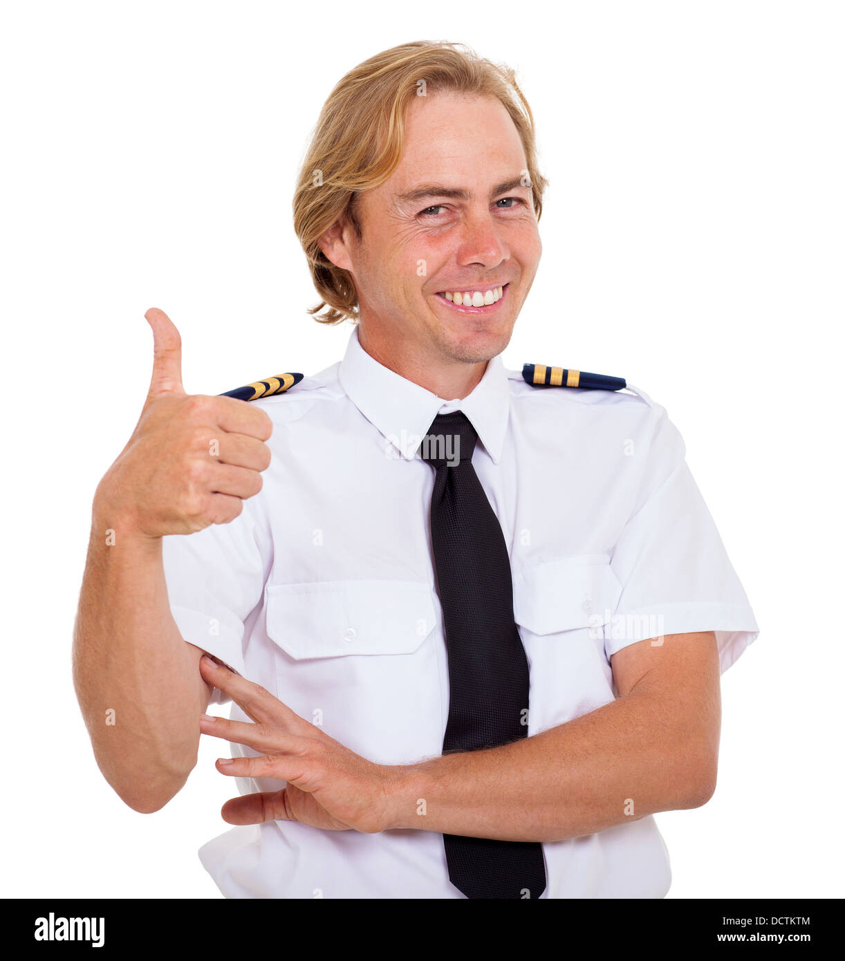 fröhliche Fluggesellschaft erster Offizier geben Daumen gegen den weißen Hintergrund Stockfoto