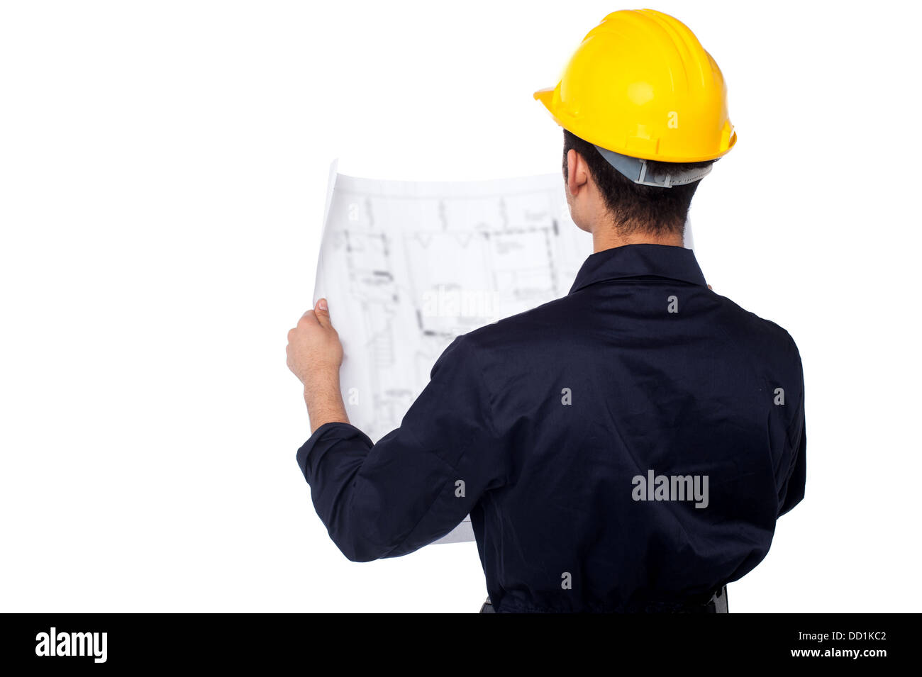 Junge männliche Bauingenieur Bauplan Website zu überprüfen. Stockfoto