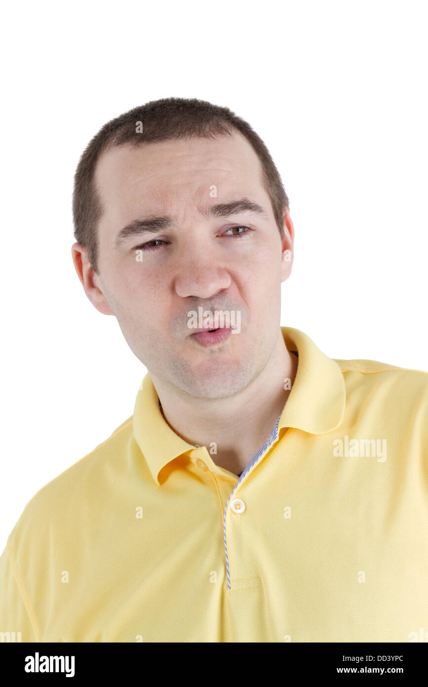 Mann mit der Enttäuschung in seinem Gesicht auf einem weißen Hintergrund Stockfoto