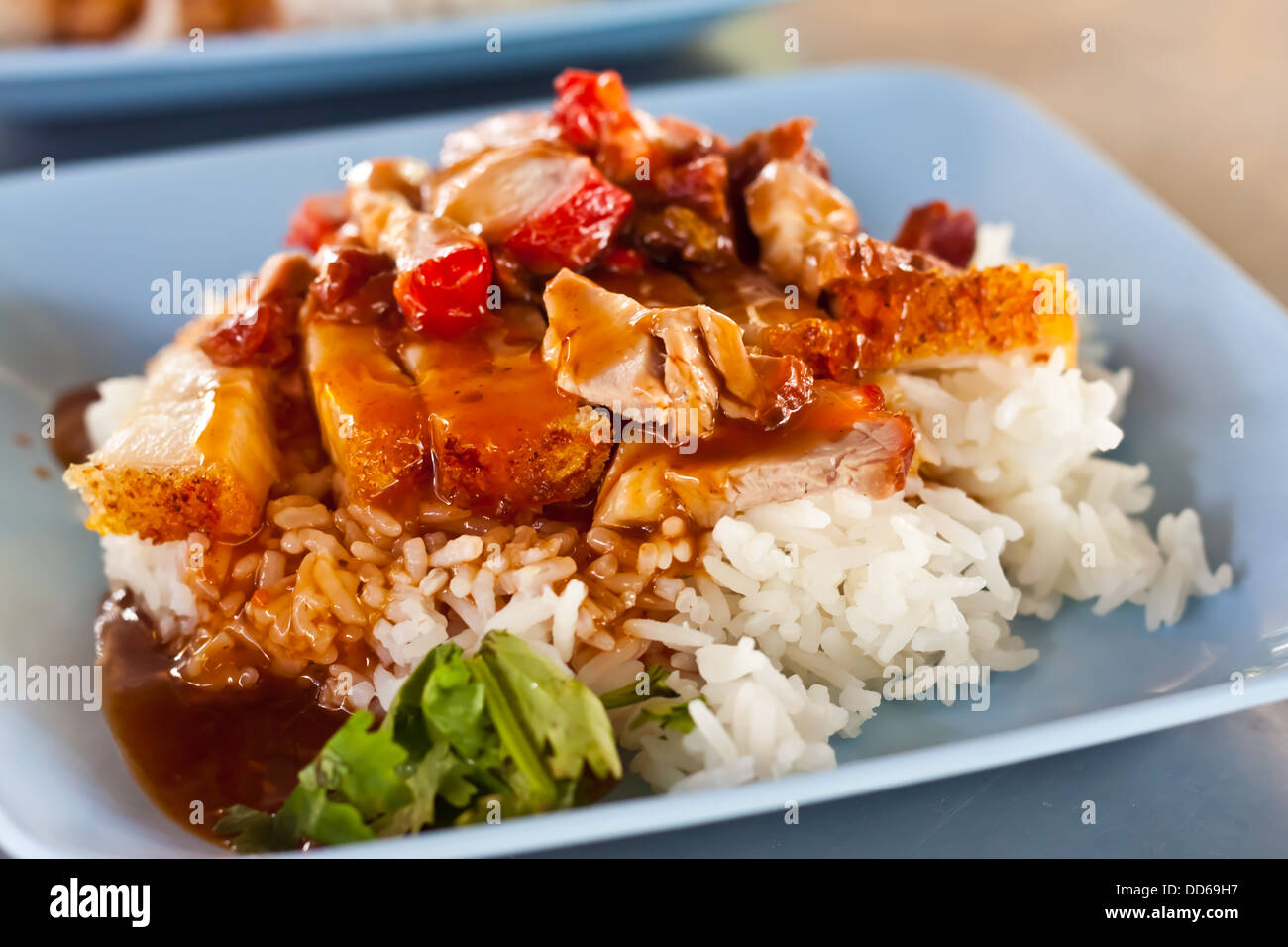 Reis mit gebratenem Schweinefleisch Stockfoto