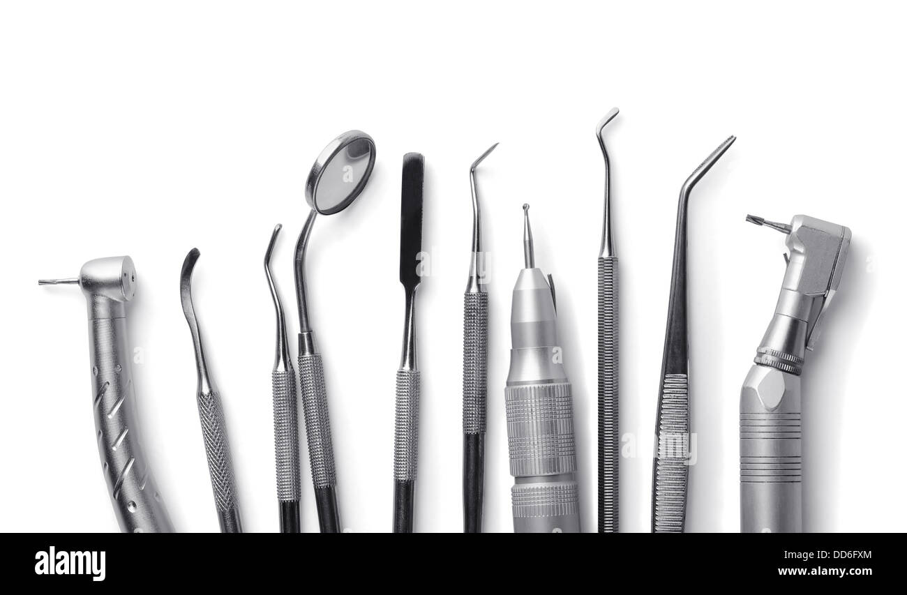 Reihe von verschiedenen Dentalwerkzeuge isoliert auf weiss Stockfoto