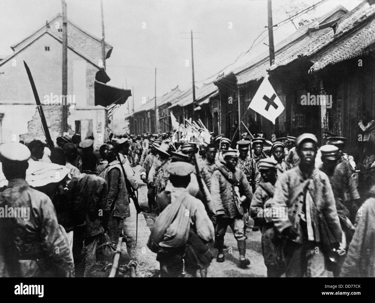 Rückzug der chinesischen nationalistischen Soldaten in die Stadt von Tai-an. Der zweite Sino-japanische Krieg begann im Jahr 1937 und zusammengeführt Stockfoto