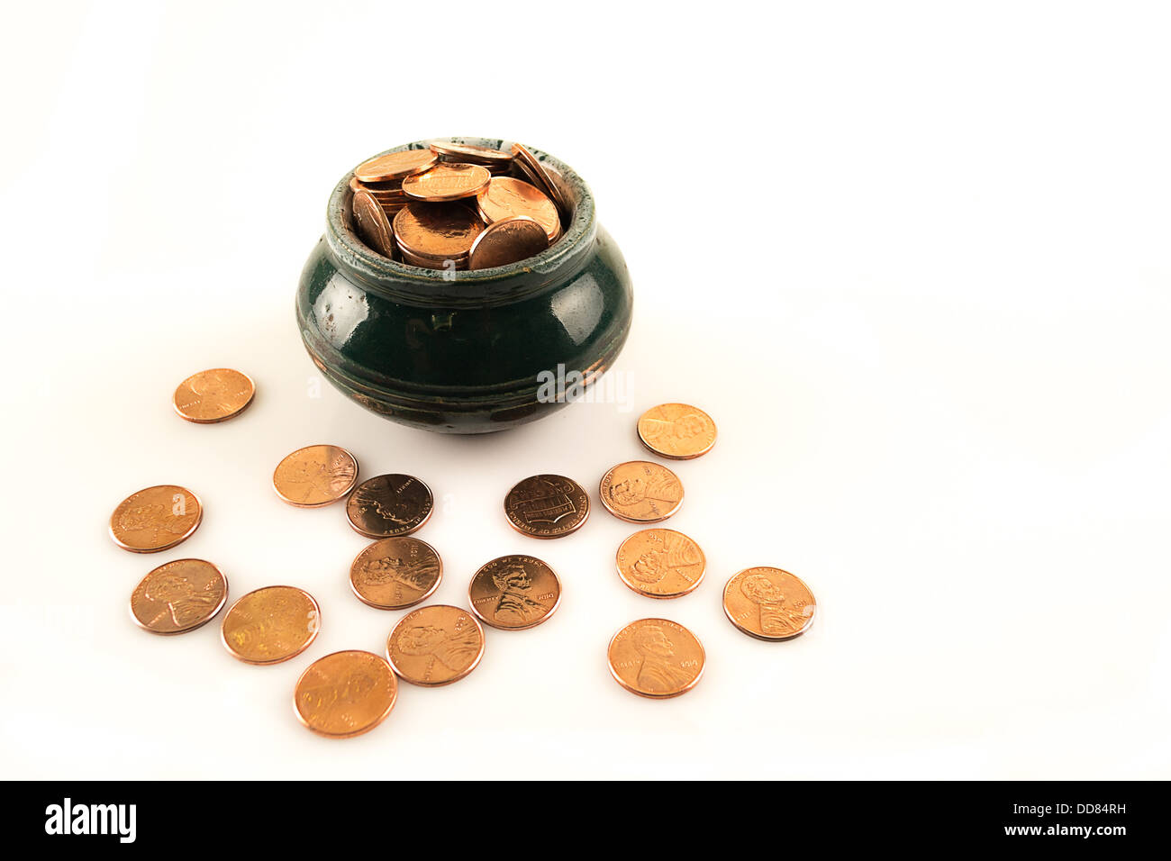 Keramik Topf voller Münzen Stockfoto