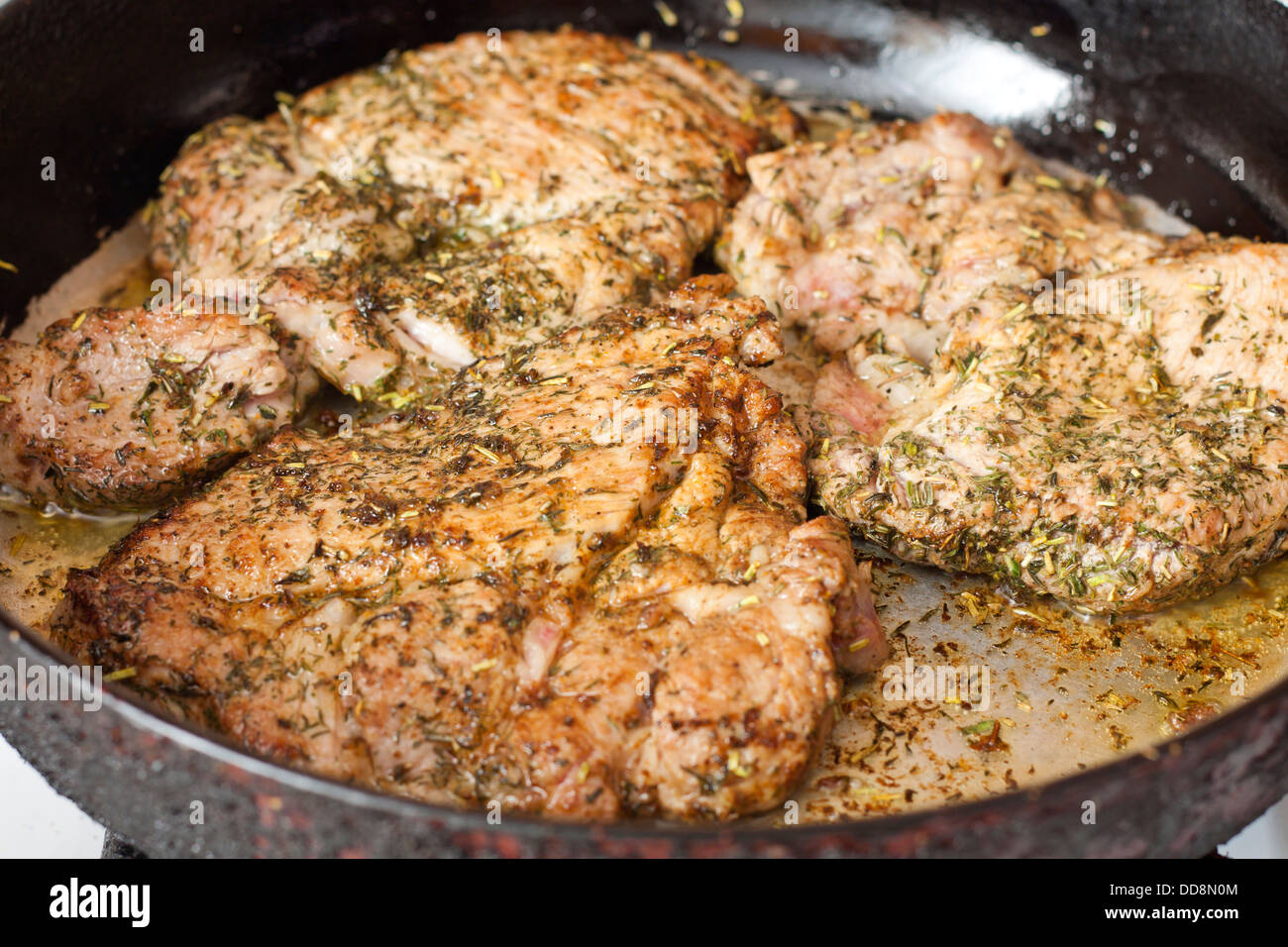 Gegrilltes Schweinefleisch Steak mit Kräutern und Gewürzen Stockfoto