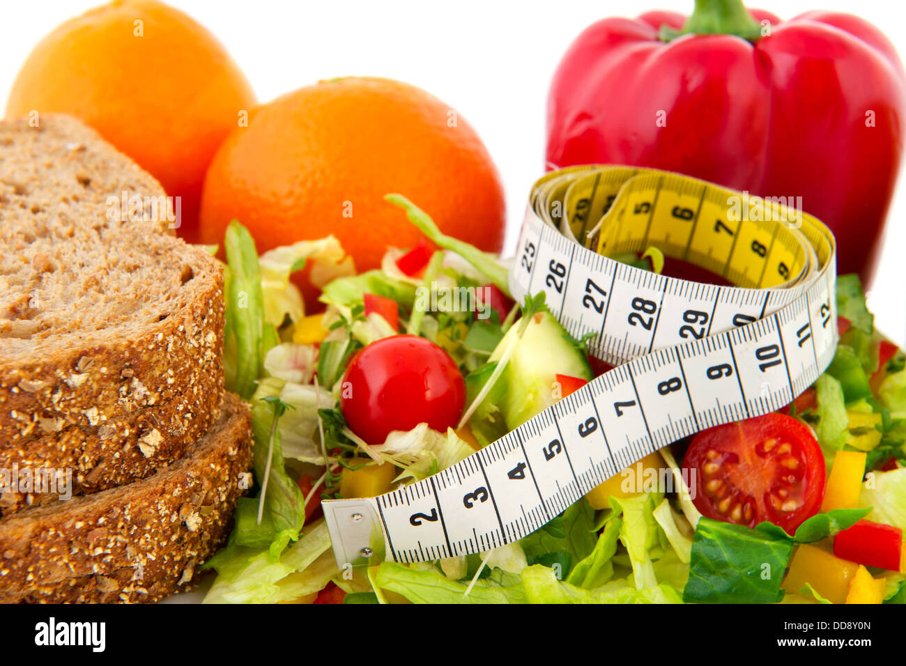 Diät-Mahlzeit mit Maßband Stockfoto