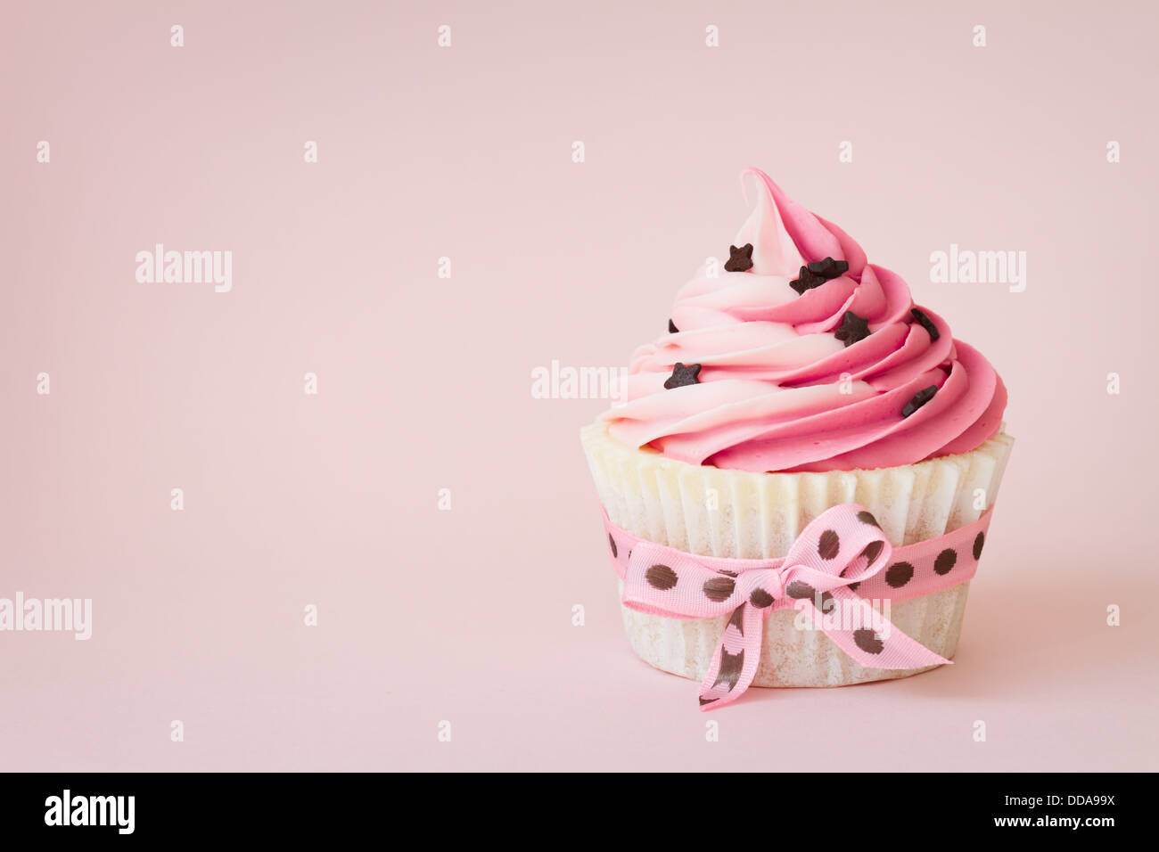 Rosa Cupcake mit Platz für Kopie Stockfoto