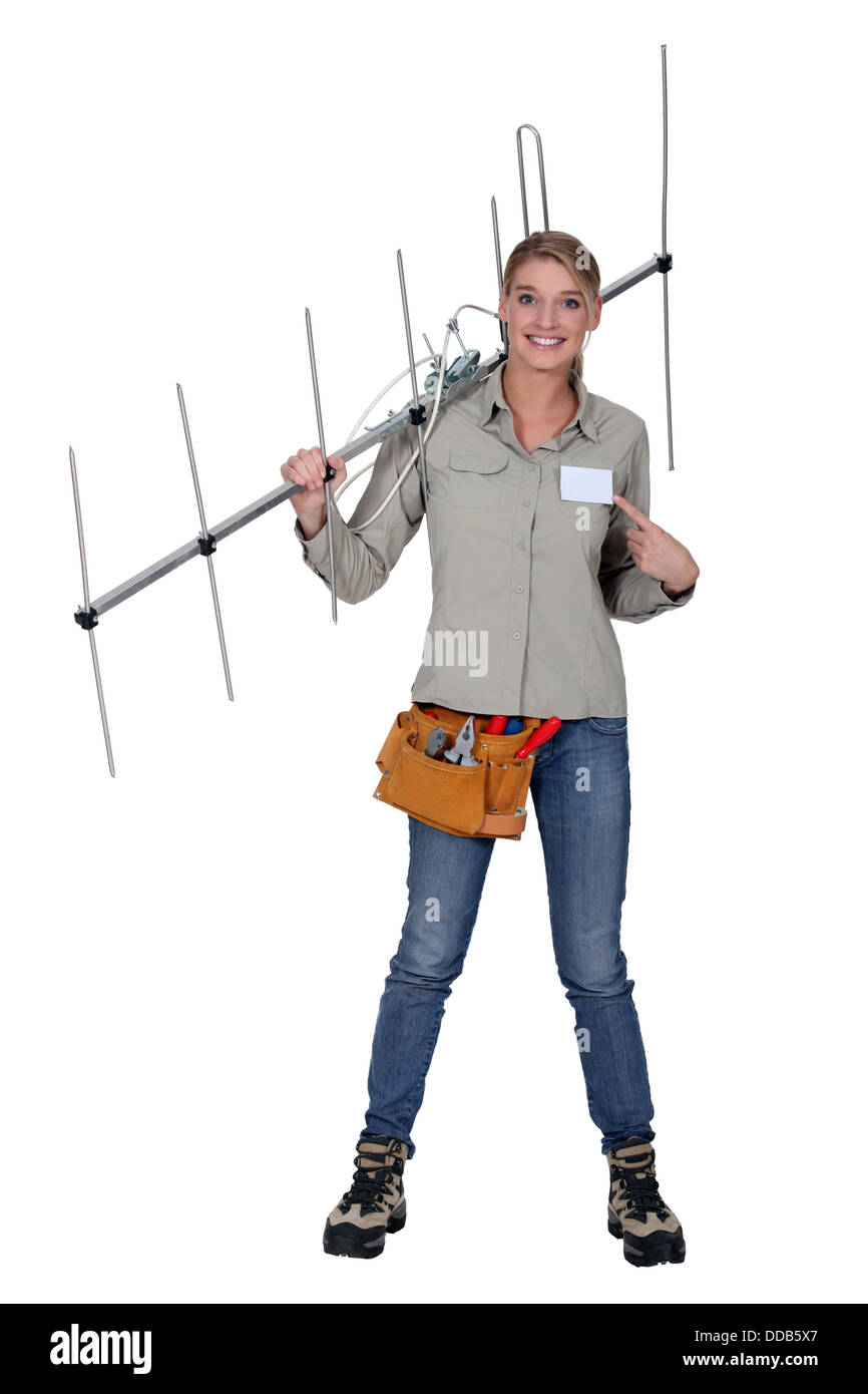 Weibliche Antenne installer Stockfoto