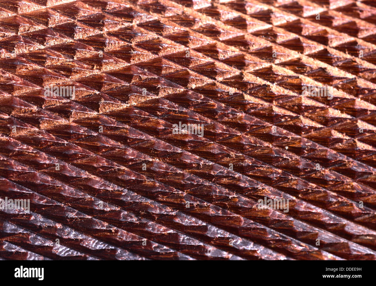 Extreme Makroaufnahme einer Holz karierten Pistole Griff Stockfoto