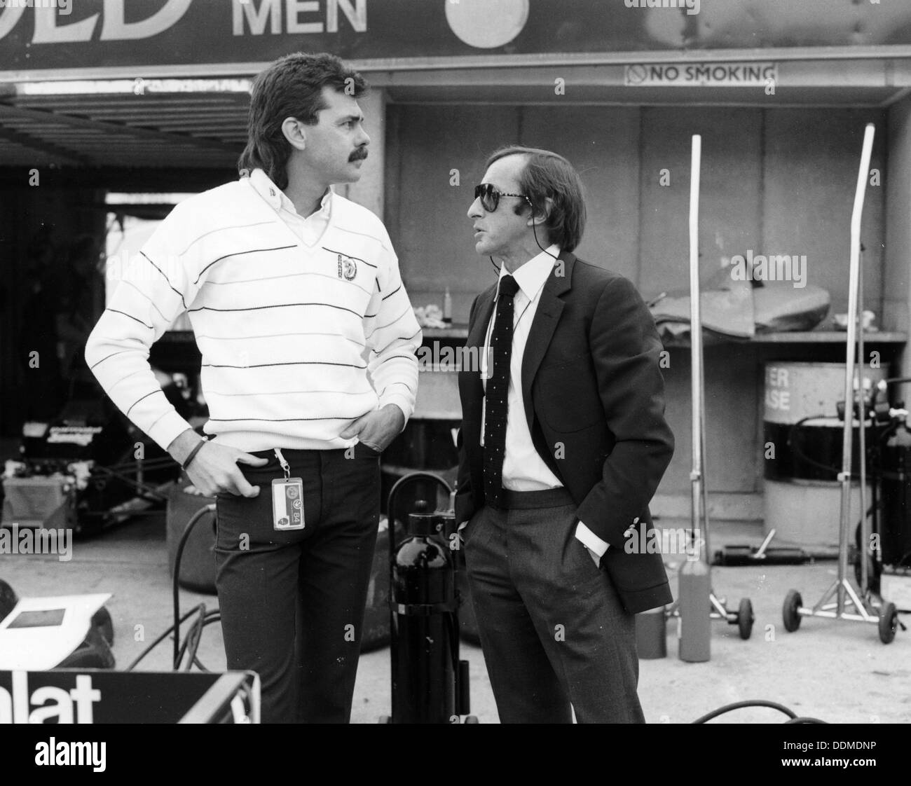 Gordon Murray (links) mit Jackie Stewart, Juli 1984. Artist: Unbekannt Stockfoto