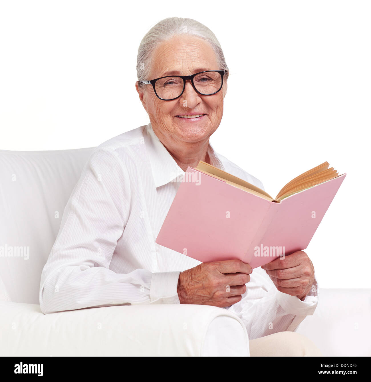 Porträt von älteren Weibchen in Brillen Buch Stockfoto
