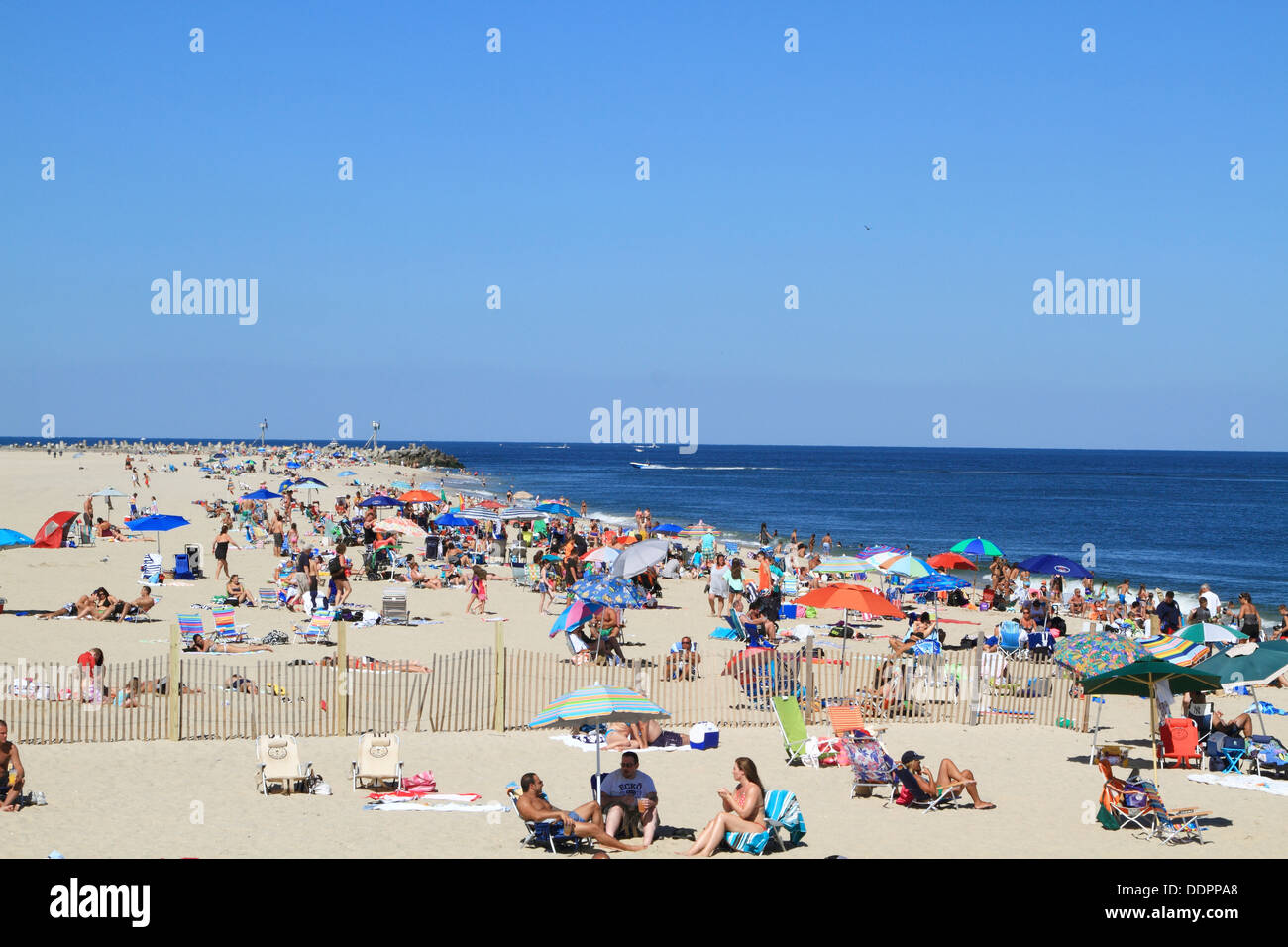 Sonnenanbeter am Point Pleasant Beach, New Jersey, USA Stockfoto