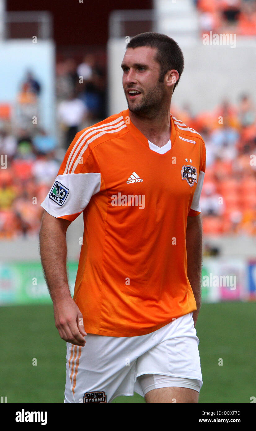Houston, Texas, USA. 8. September 2013. SEP 08 2013: Houston Dynamo nach vorn schreit Will Bruin #12 nahe Side Linienrichter während des MLS-Saison-Spiels zwischen Houston Dynamo und die New York Red Bulls von BBVA Compass Stadion in Houston, TX. Bildnachweis: Csm/Alamy Live-Nachrichten Stockfoto