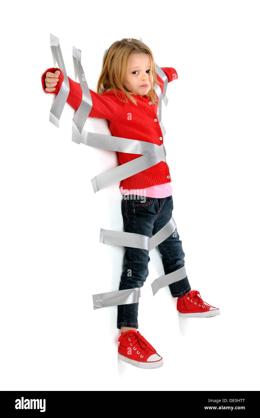 Junge Mädchen gefesselt mit Klebeband an der Wand Stockfotografie - Alamy