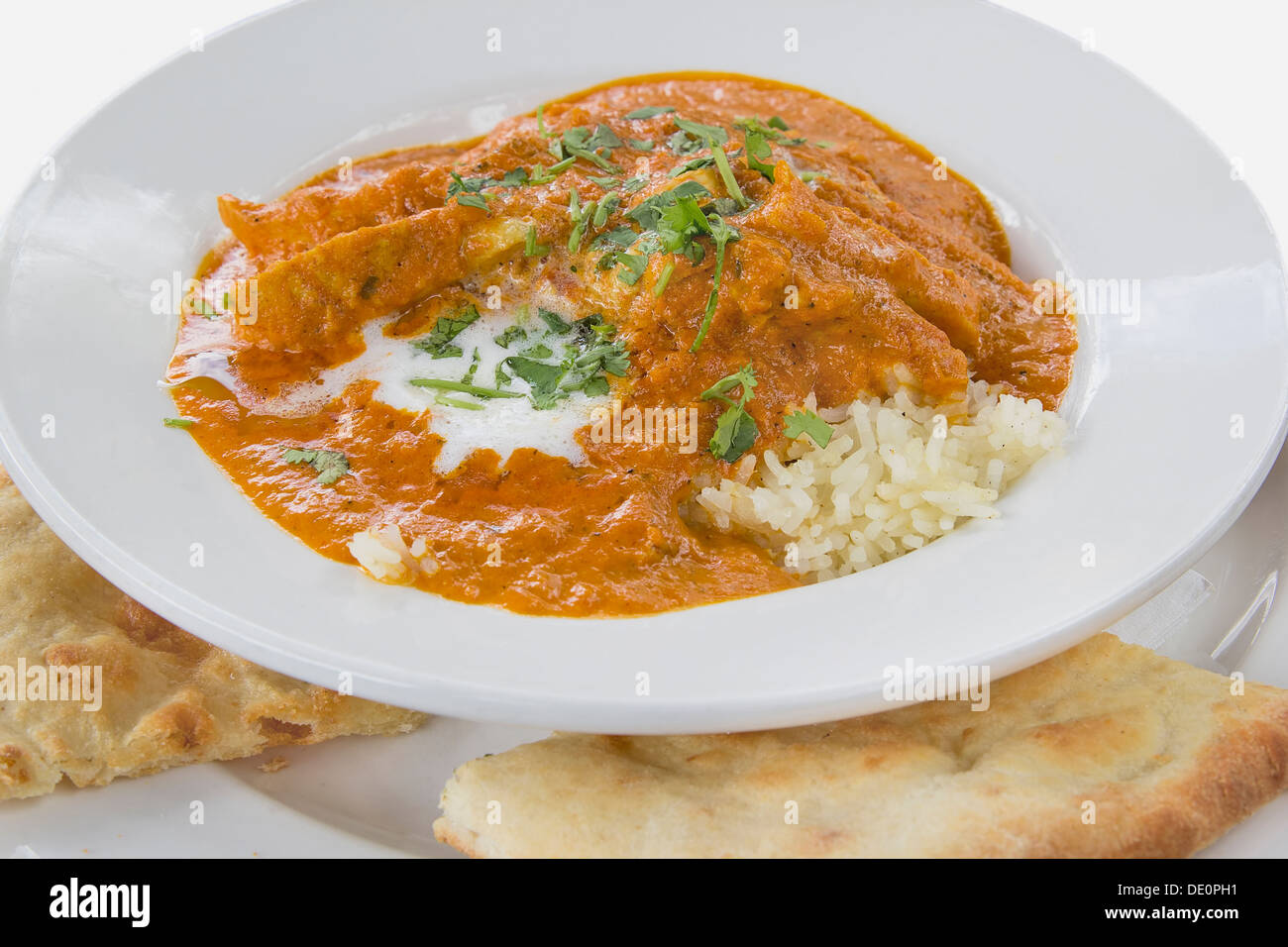 Ostindischen Butter Chickencurry über Basmati Reis mit Naan-Brot Stockfoto