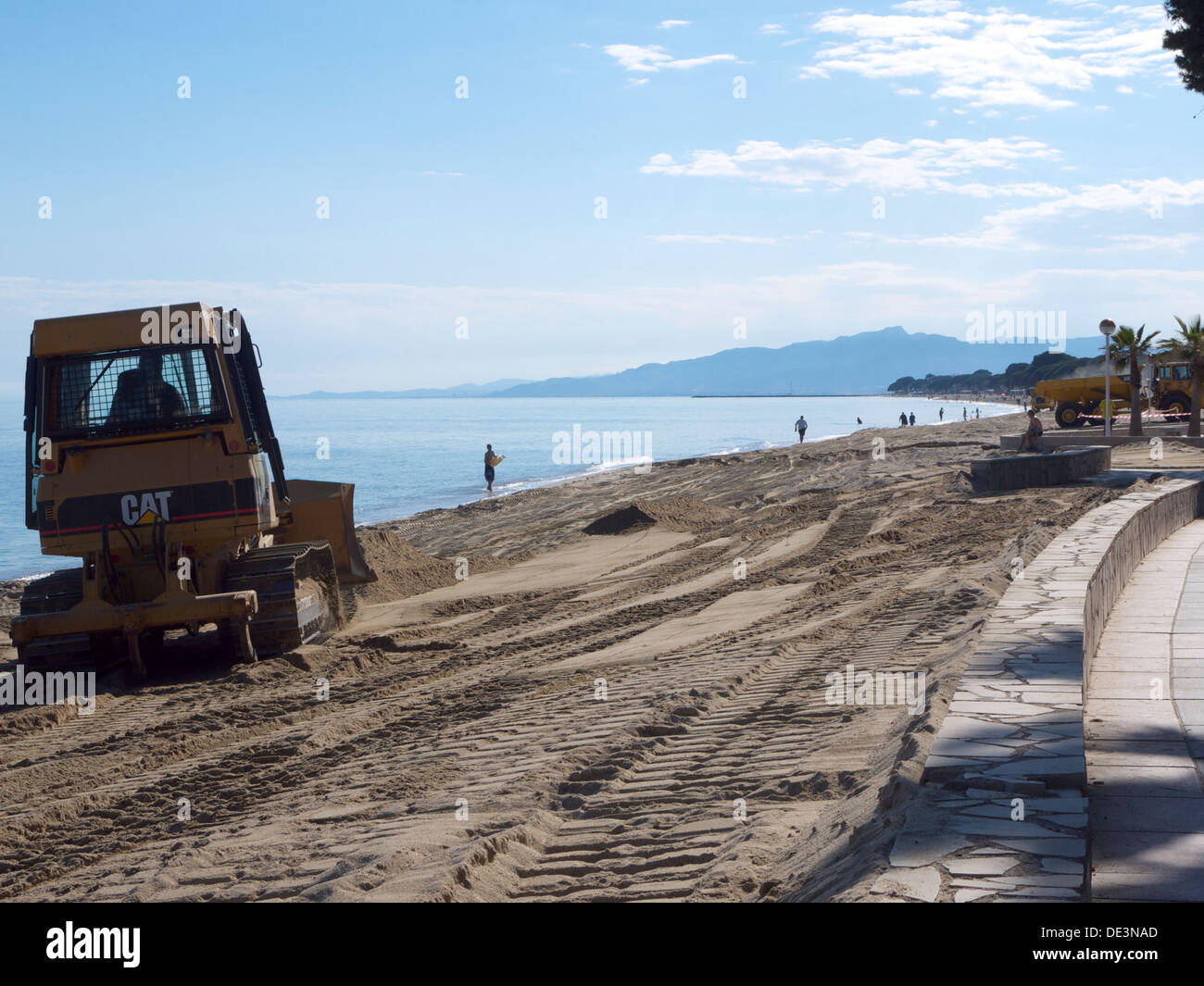 JCB Typ Digger Strand Sand bewegen. Stockfoto