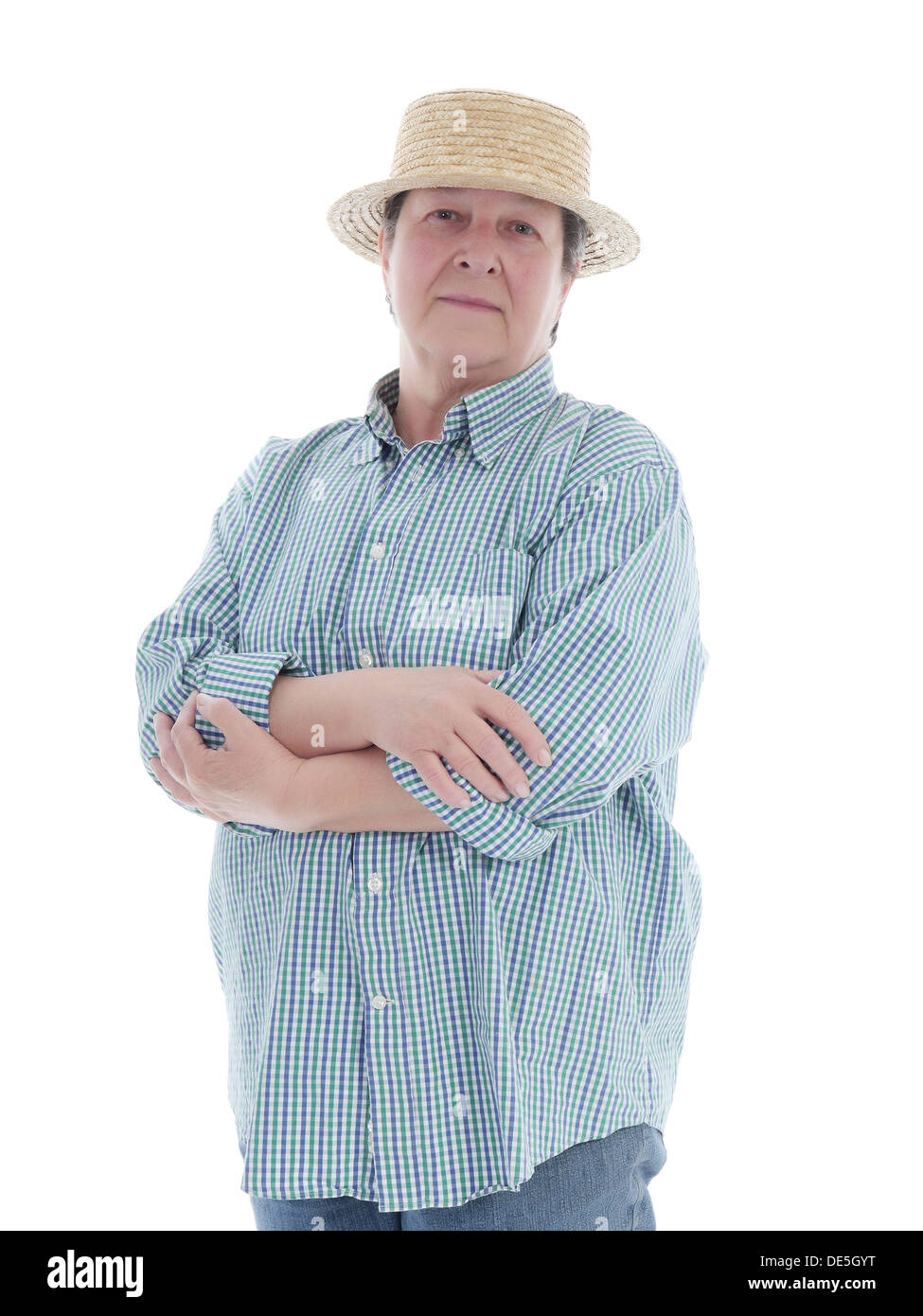 Weibliche senior Gärtner Stroh Hut posiert auf weißem Hintergrund Stockfoto