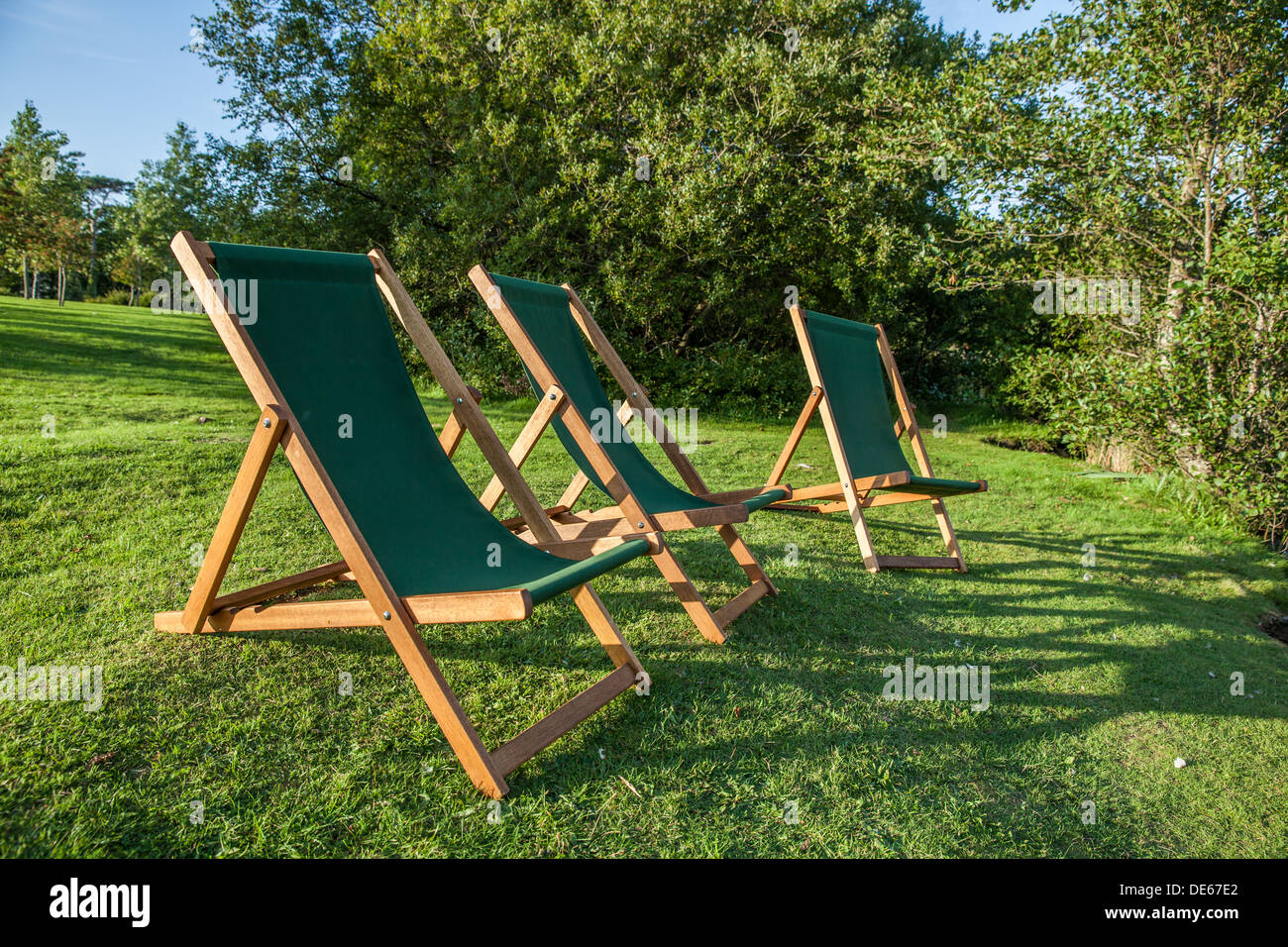 Grünen Liegestühle bei Sonnenuntergang Stockfoto, Bild: 60373882 - Alamy