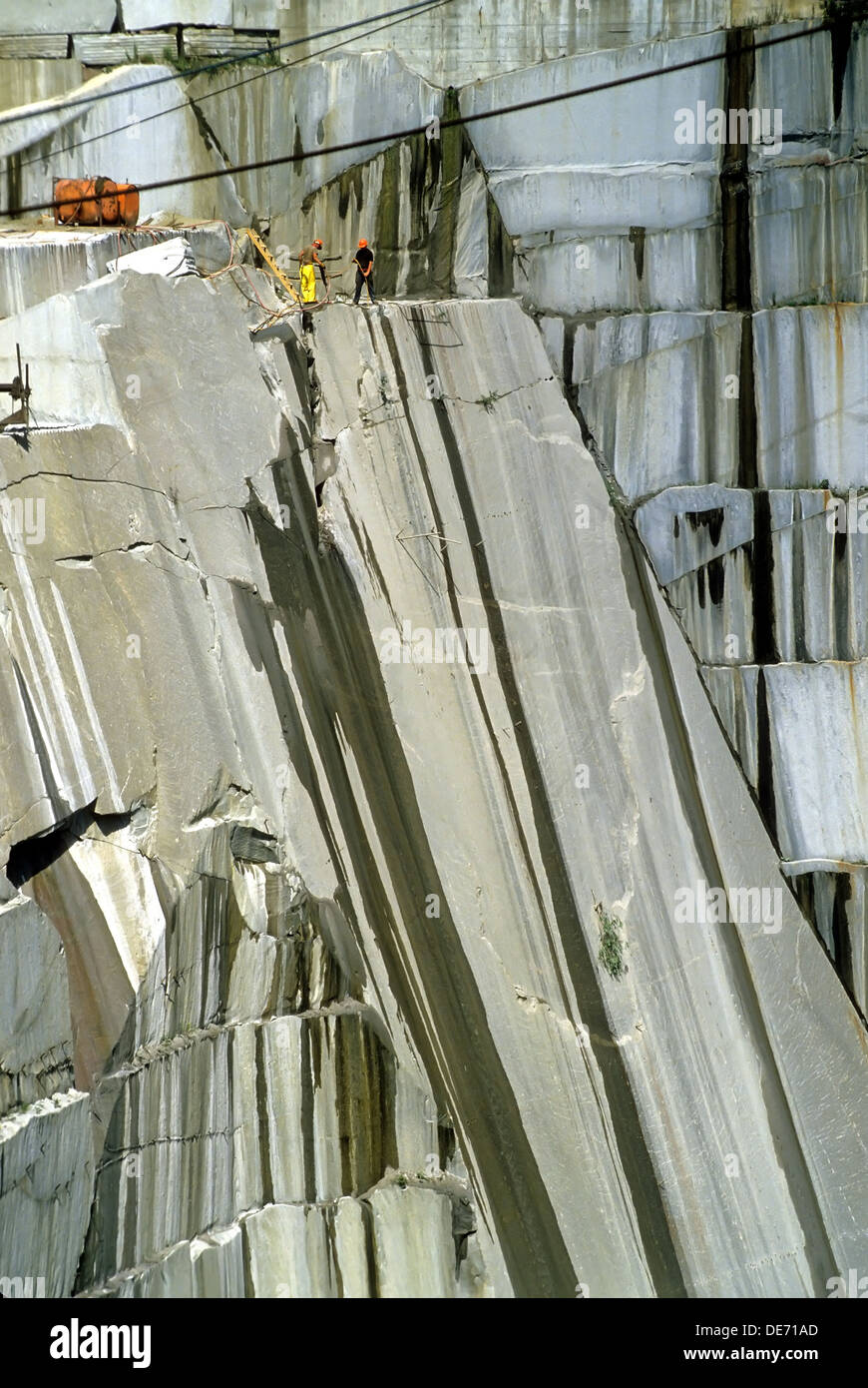 Männer schneiden Stein aus dem Tagebau-mine am Rock of Ages Steinbruch in Barre, VT, USA. Stockfoto