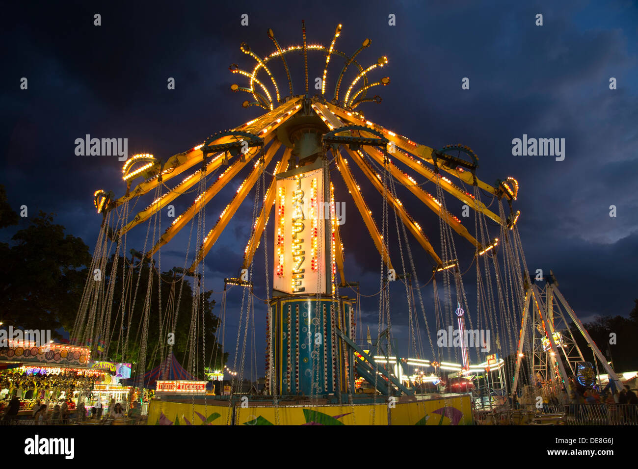 Chatham, New York - The Trapeze Stuhl Schaukel Fahrt im Columbia County Fair. Stockfoto