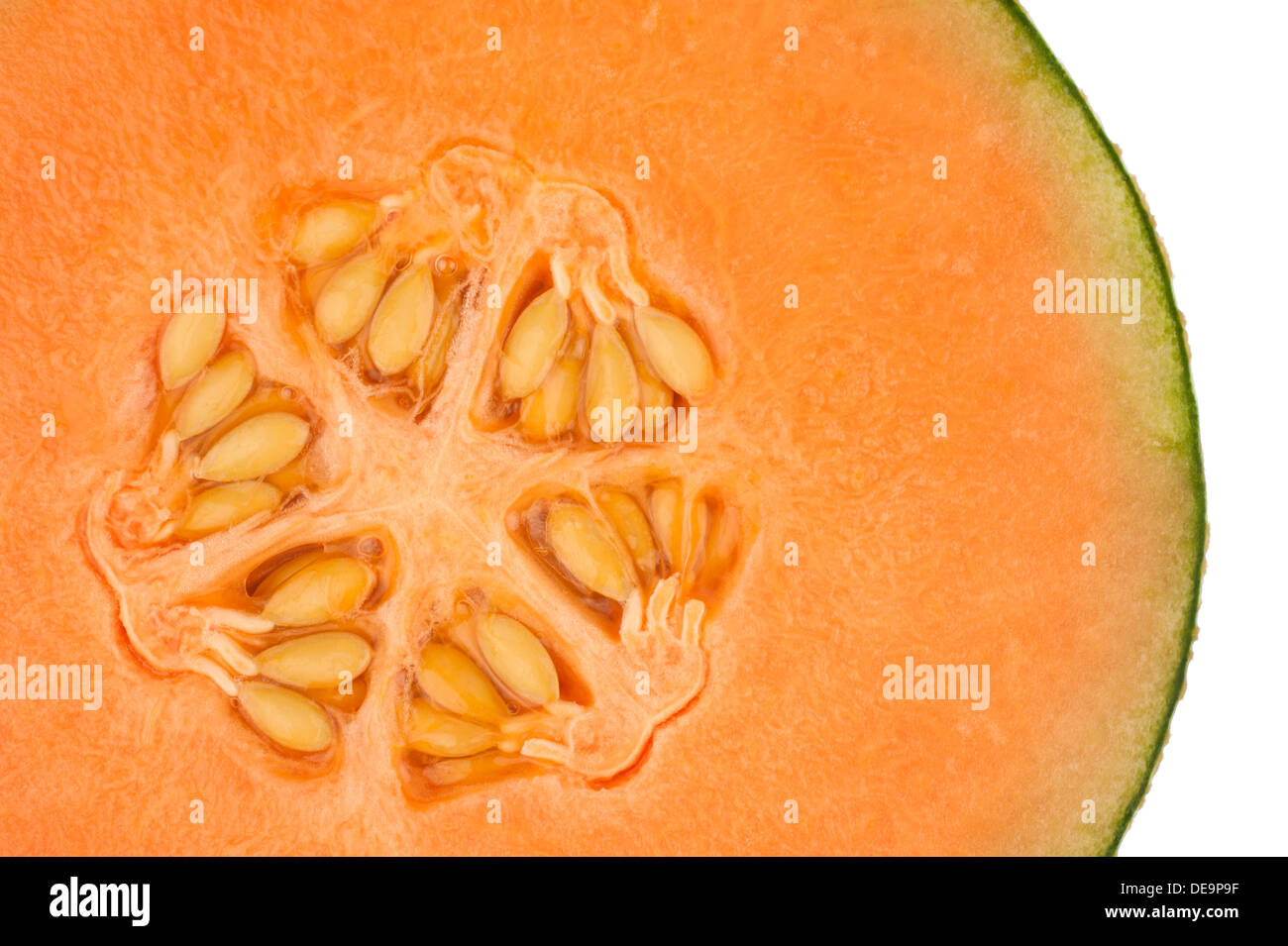 Eine Seite von einem orange Honigmelone in Nahaufnahme Stockfoto
