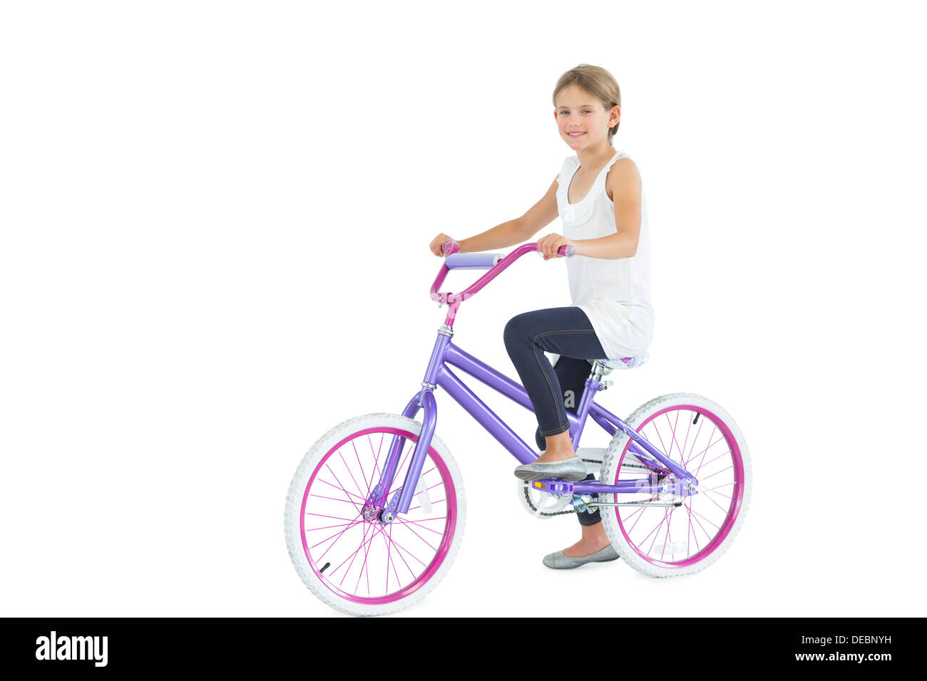 Süße junge Mädchen Reiten Fahrrad lächelnd Stockfoto