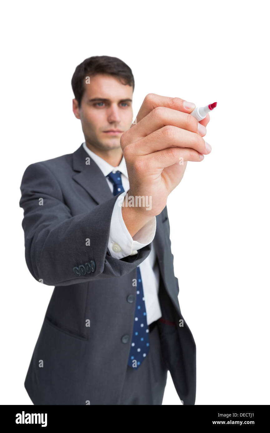 Konzentriert Geschäftsmann mit roten marker Stockfoto