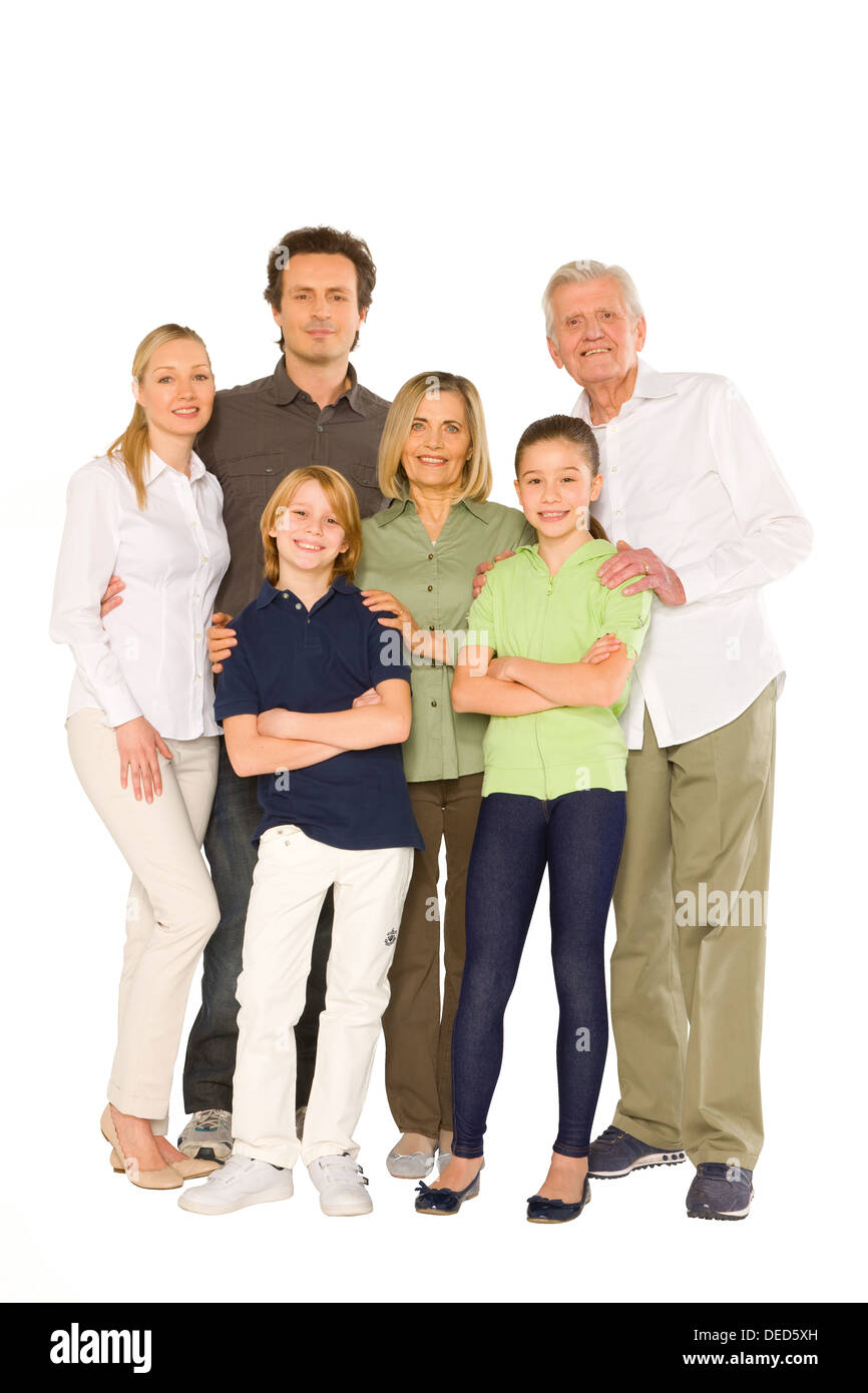 drei Generationen Familie stehen isoliert auf weißem Hintergrund Stockfoto