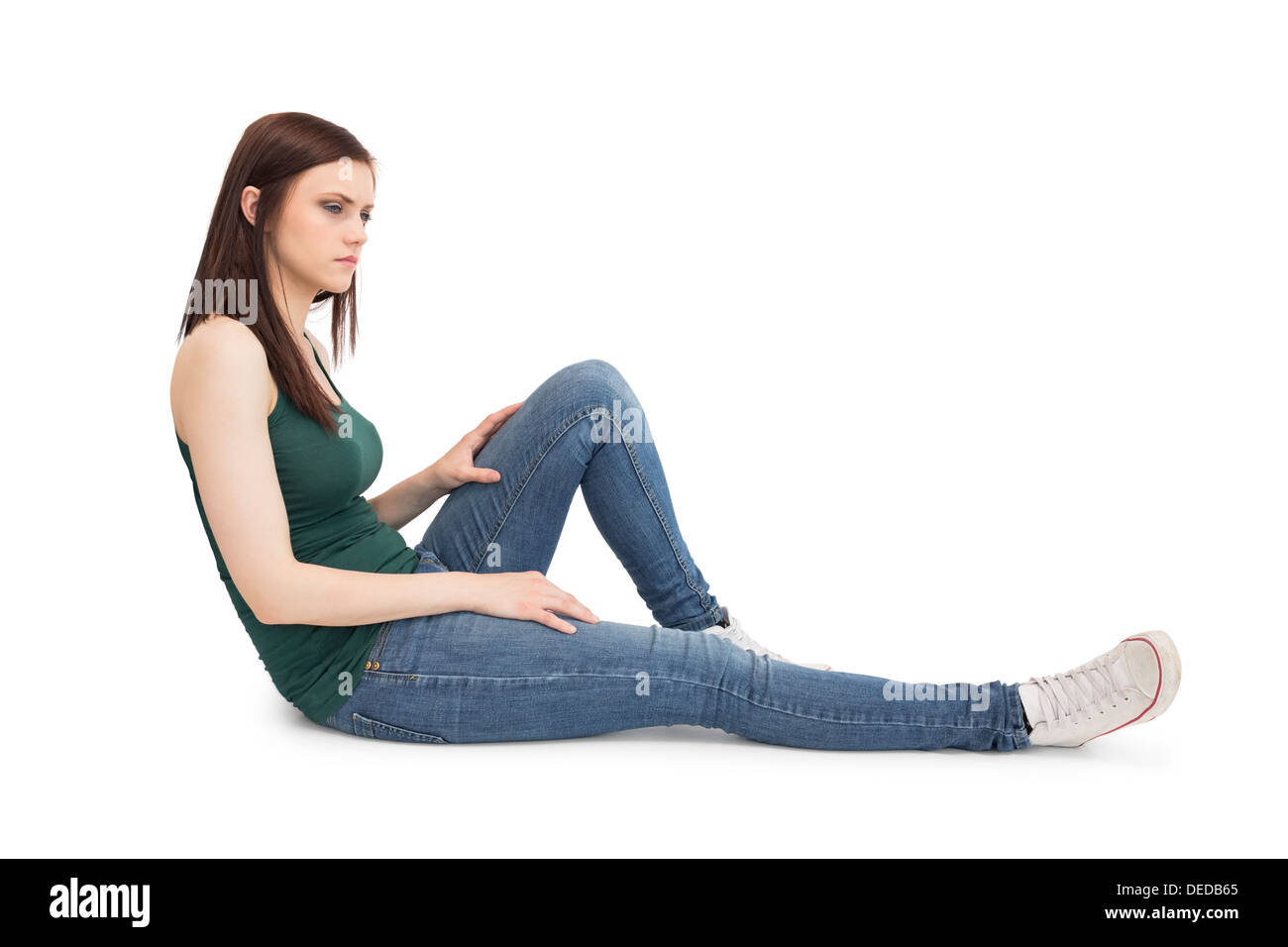 Nachdenklich attraktive Brünette sitzen Stockfoto