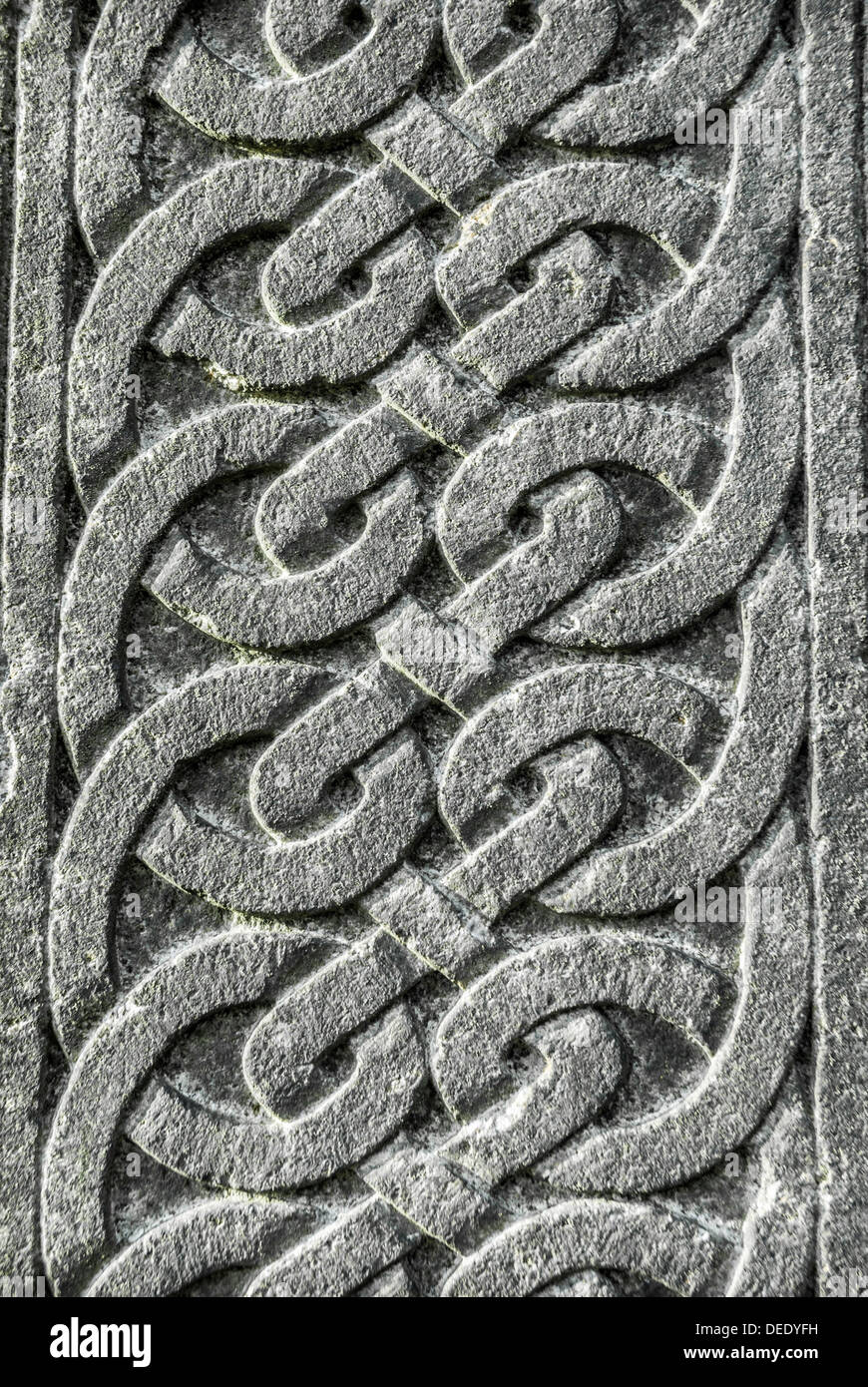 Keltischen Knoten Stellwerk in Stein gemeißelt. Stockfoto