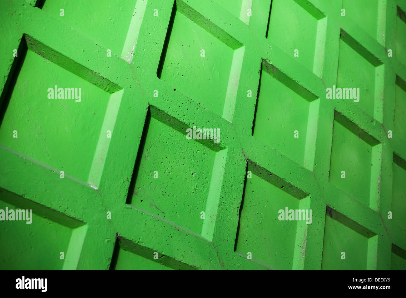 Abstrakte Fragment des hellen grünen Betonzaun Wand Stockfoto