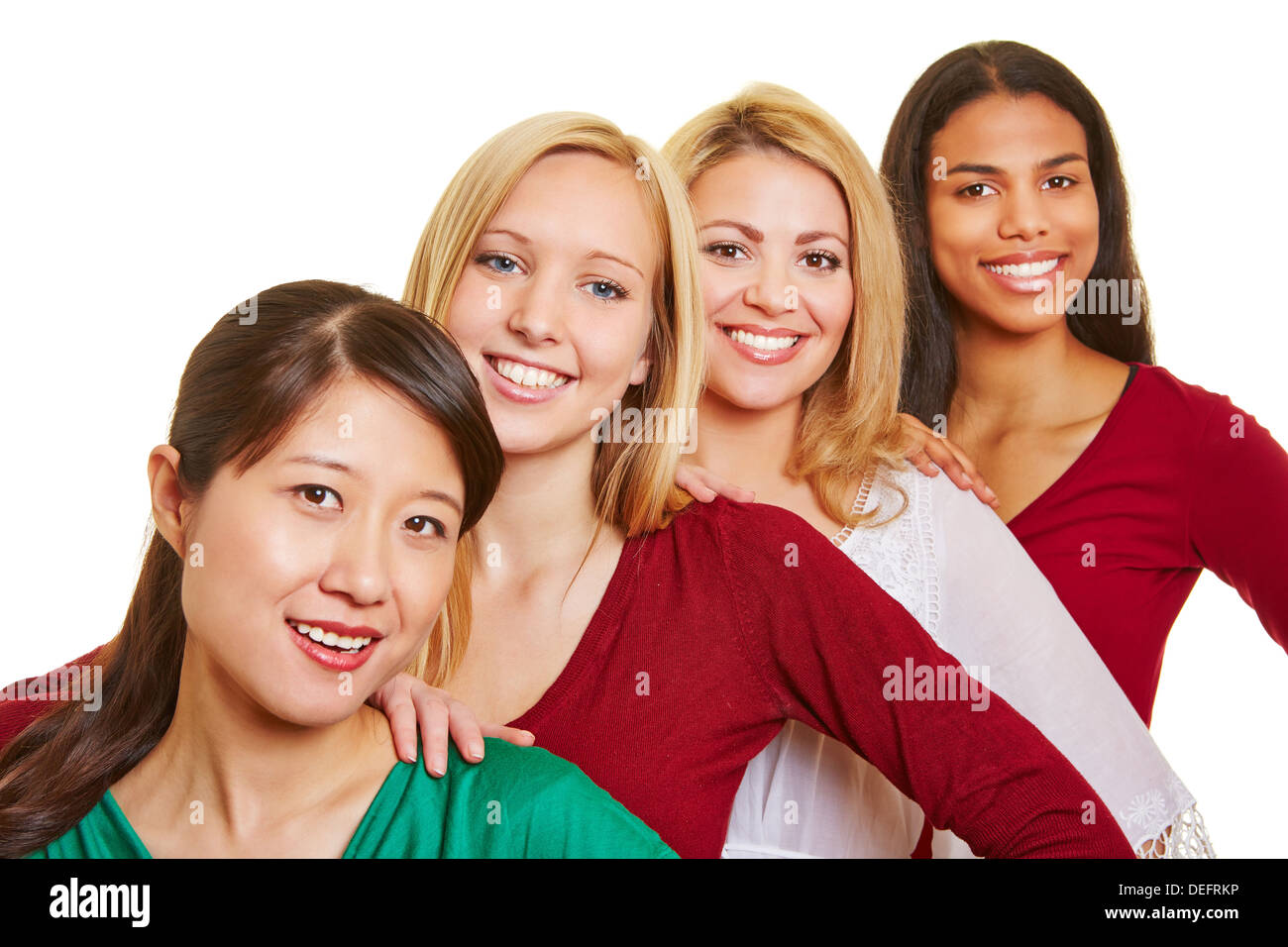 Gruppe von vier glückliche Frauen in einer Reihe Stockfoto