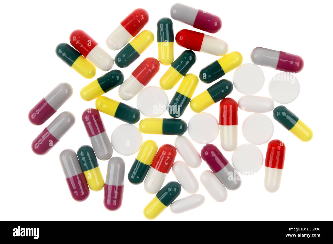Pillen und Kapseln isoliert gegen weiß Stockfoto
