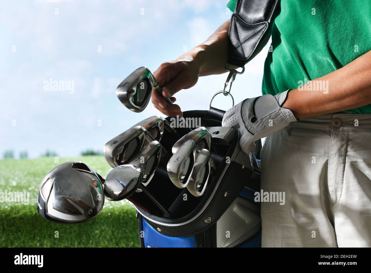 Golfspieler, die Tasche Golf Club entfernt Stockfoto
