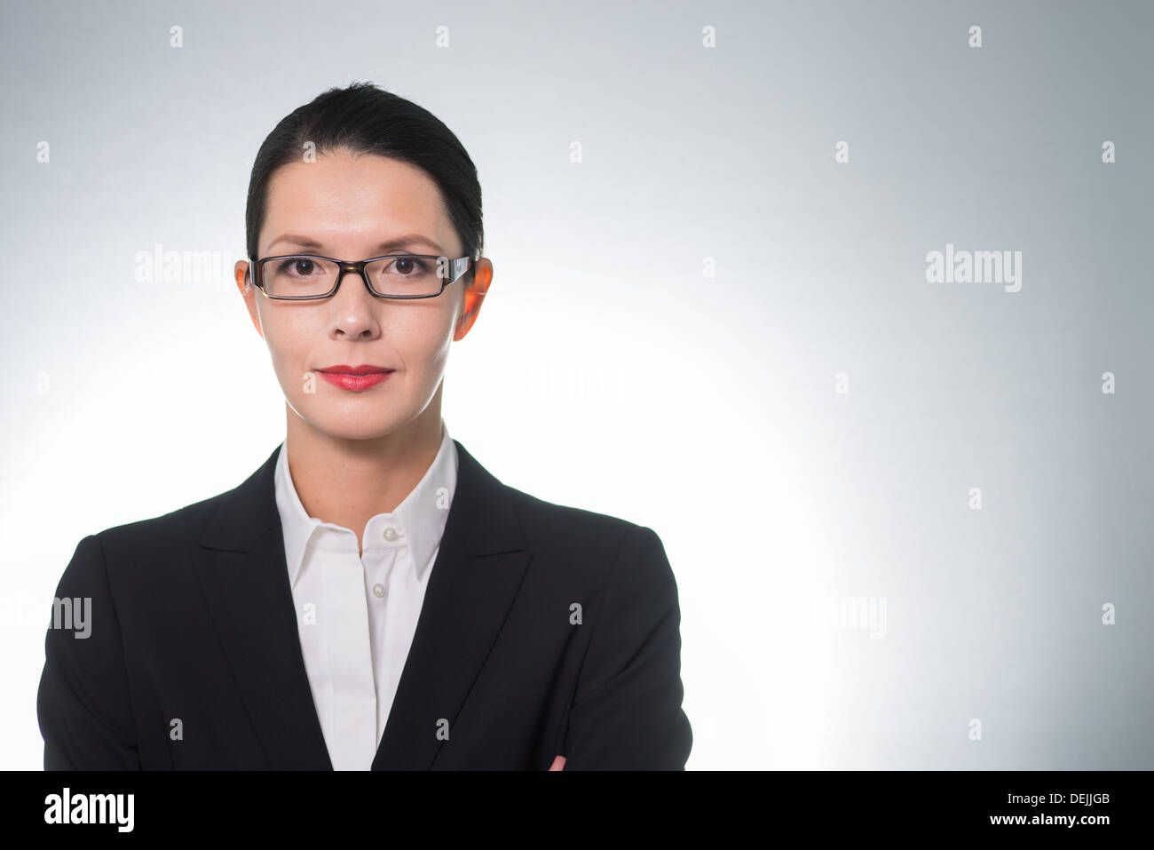 Stilvolle zuversichtlich Geschäftsfrau Stockfoto