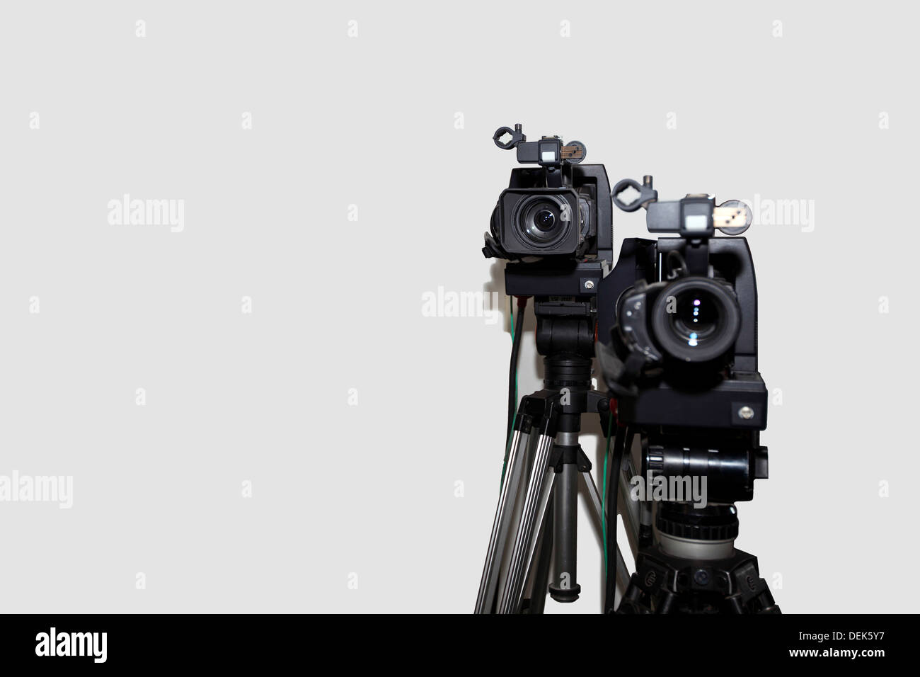 Kamera-Stativ vor weißem Hintergrund Stockfoto