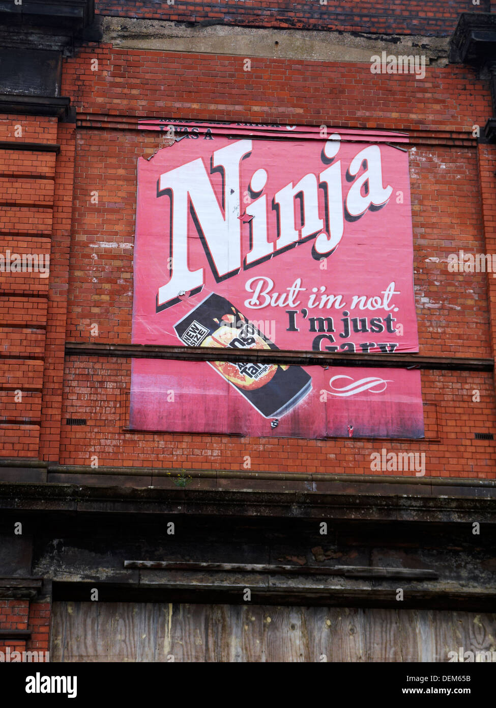Tango-Anzeige auf Gebäude in Manchester UK Stockfoto