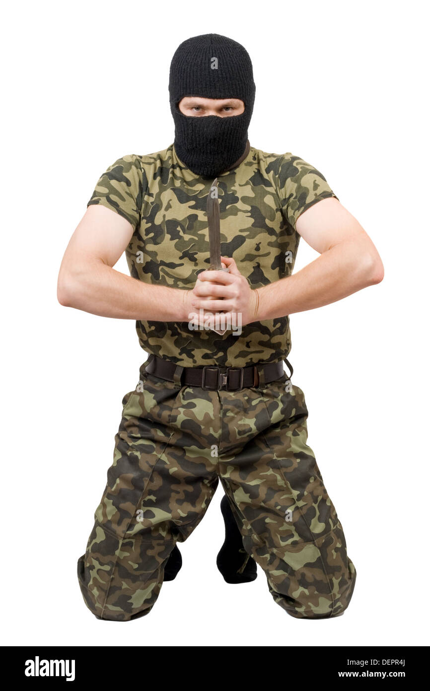 Der Mann mit einem Messer in eine schwarze Maske über weiß Stockfoto