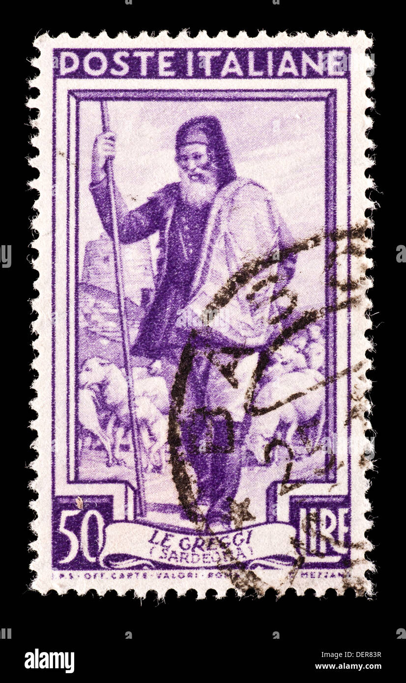 Briefmarke aus Italien, die Darstellung eines Hirten und seiner Herde. Stockfoto