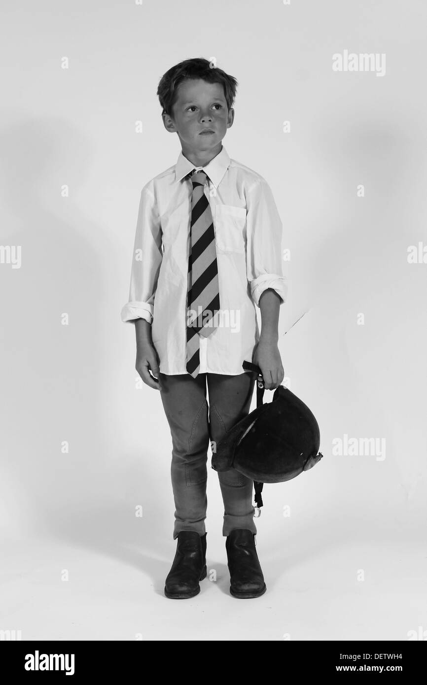 Junge im kümmerlichen Club kit Stockfoto