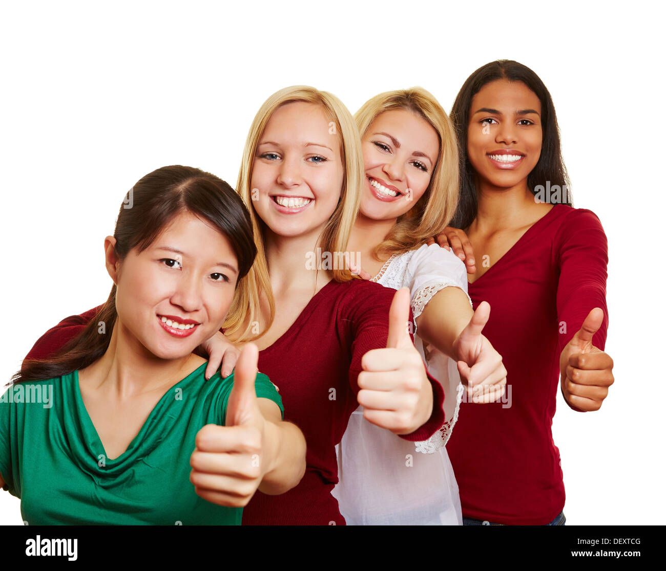 Team des Lächelns multikulturelle Frauen die Daumen hochhalten Stockfoto