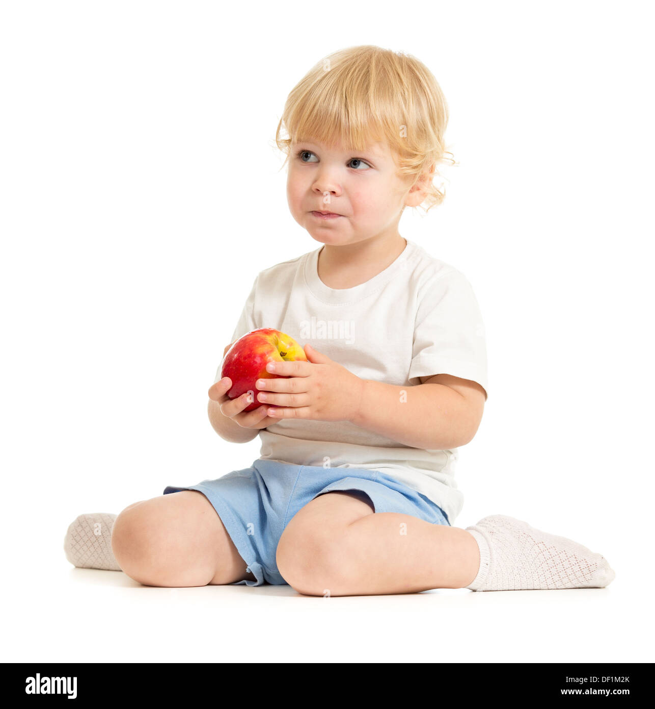 ernsthafte Kind gesunder Ernährung isoliert Stockfoto