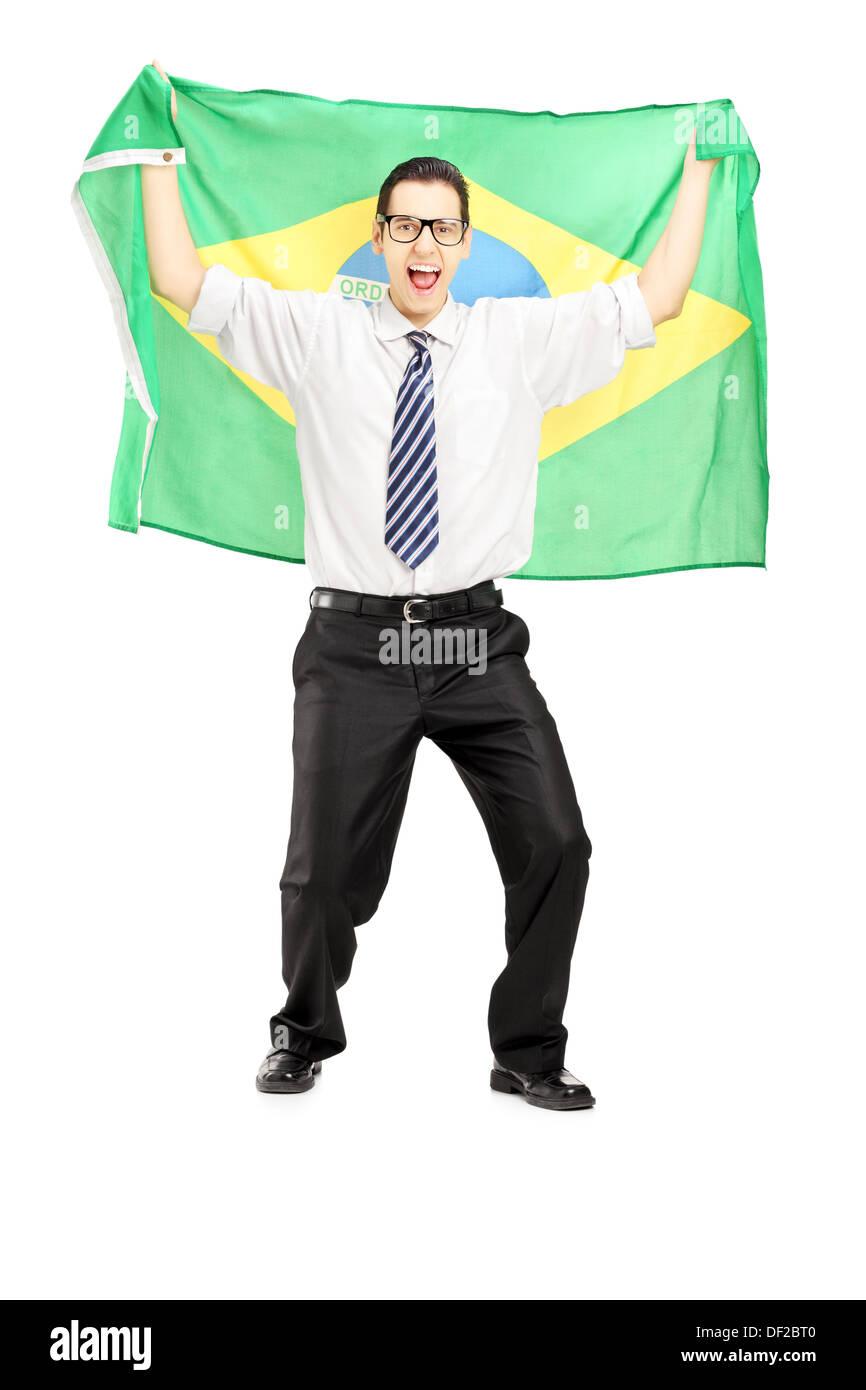 In voller Länge Portrait eines aufgeregt männlichen hält eine brasilianische Fahne Stockfoto