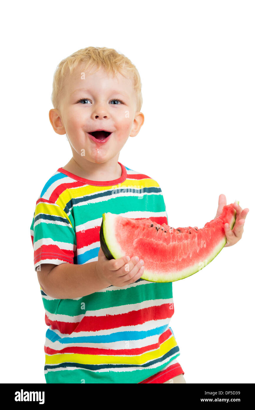 Kleiner Junge Essen Wassermelone isoliert auf weiss Stockfoto