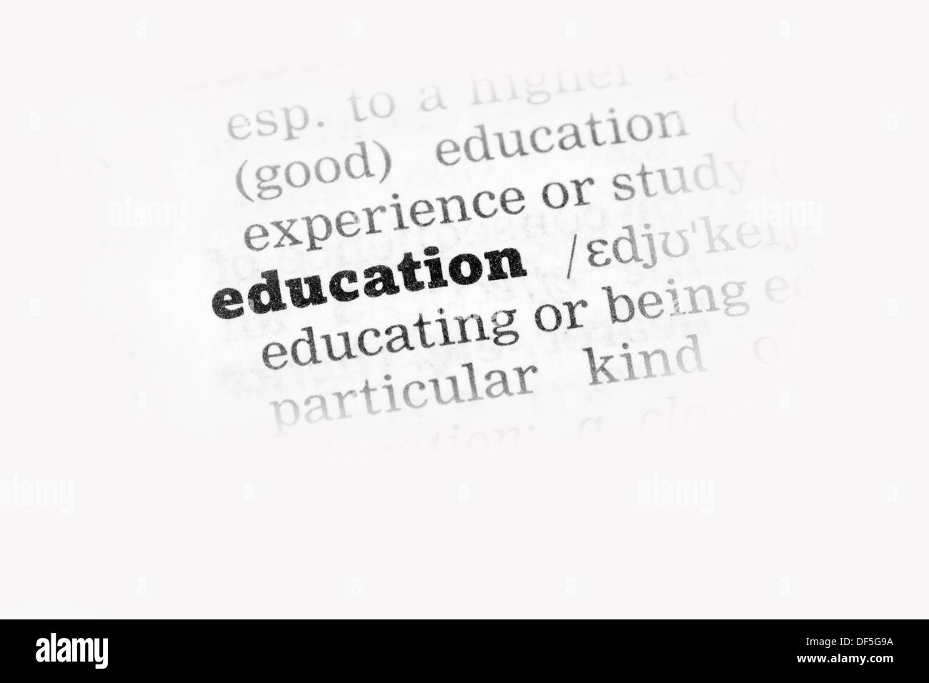 Bildung Wörterbuchdefinition Einzelwort mit soft focus Stockfoto