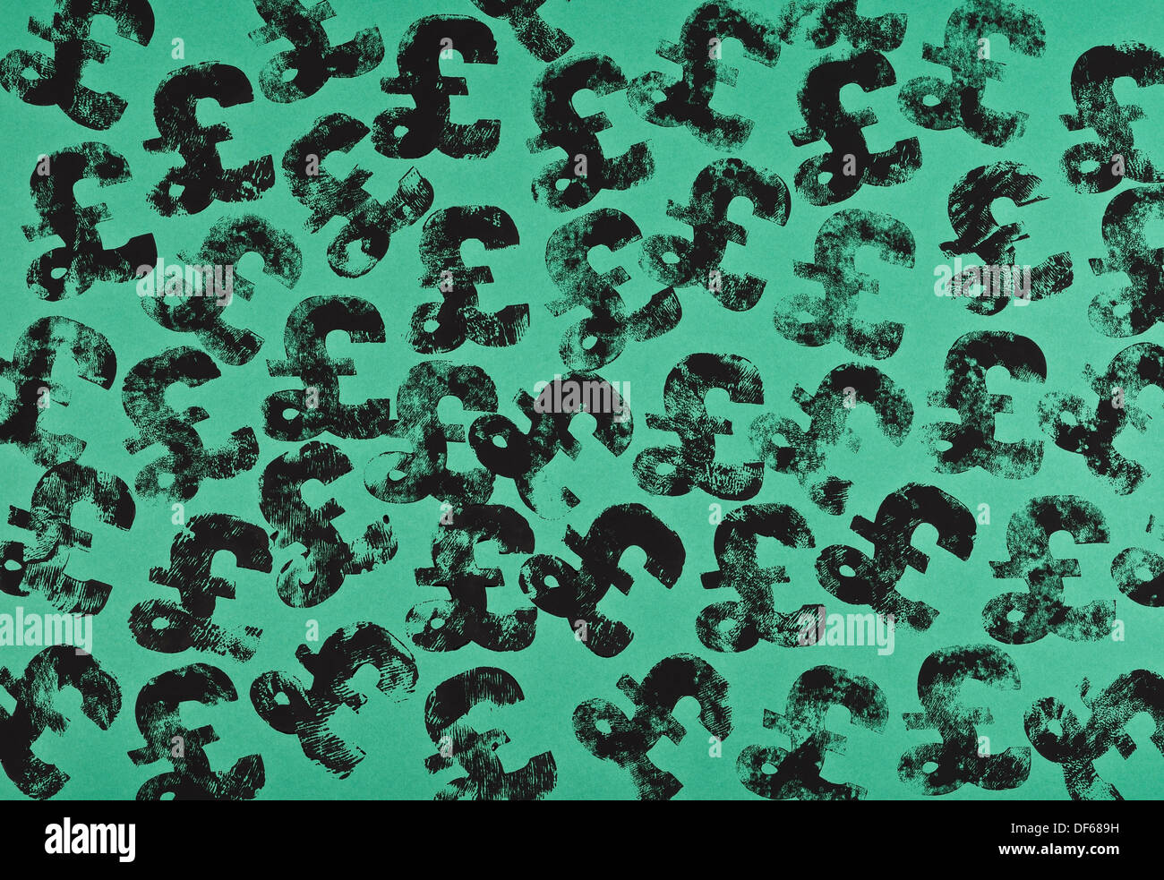 UK Sterling Pfund-Symbol gedruckt auf grünem Papier Stockfoto