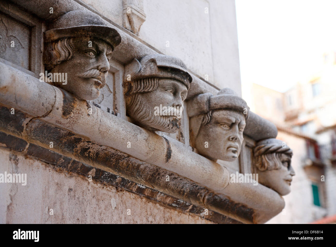 Sibenik-Architektur. Stein-Köpfe auf st. Jakob-Kathedrale. Stockfoto