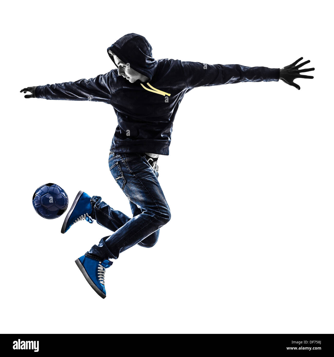 ein junger Mann Freestyler Fußballspieler in der Silhouette auf weißem Hintergrund Stockfoto