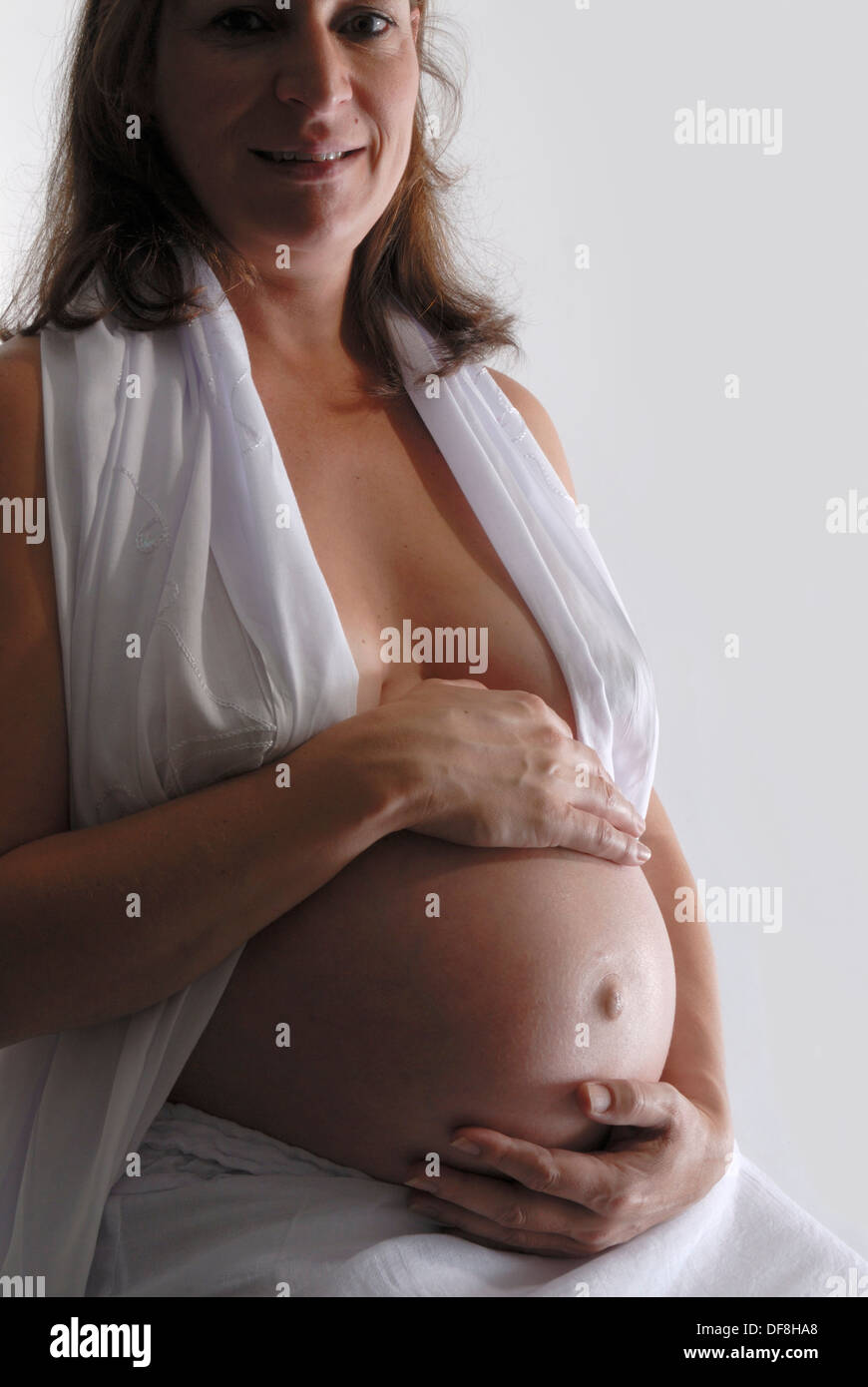 Frau mit Zwillingen schwanger Stockfoto
