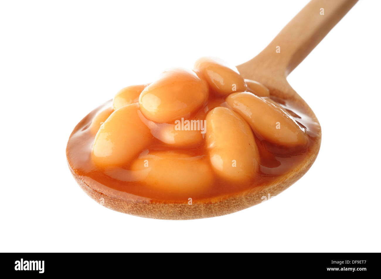 gebackene Bohnen in Holzlöffel Stockfoto